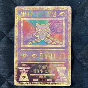 Ancient Holographic Trading Card with Gold and Purple Highlights